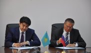Бишимбаев подписал план действий по  увеличению товарооборота с Россией