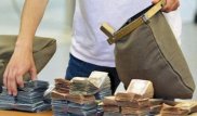 Загадочную пропажу миллиона тенге у инкассатора расследуют в Алматинской области