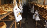 В Алматы рядом с акиматом гастарбайтеры в антисанитарных условиях пекли хлеб