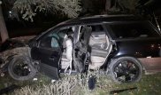 Subaru снес светофор и дорожный знак в Алматы