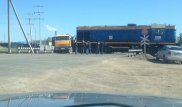 Тепловоз столкнулся с КамАЗом в Астане
