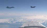 Видео с подлетевшим к самолету Шойгу истребителем НАТО появилось в Сети