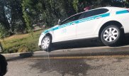 В Алматы полицейская машина упала в арык