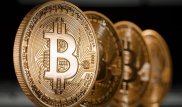 Биткоин разделился на две криптовалюты‍ и упал в цене
