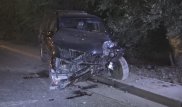 Lexus врезался в дерево и едва не взорвался в Алматы