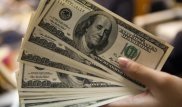 Как массовое изъятие долларов в США отразится на курсе тенге