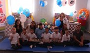Организаторы "Алматы Марафона" подарили двум школам-интернатам скалодром и спортивный инвентарь