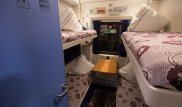 "Вечный" спор о полках в поезде: Кто имеет право в РК пользоваться нижней