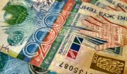 Тенге укрепился до 323 за доллар