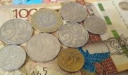 Тенге ослаб до 325 за доллар