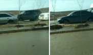 Талые воды подтопили улицу Момышулы в Алматы