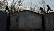В Астане убирают металлические гаражи из дворов