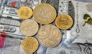 Тенге ослаб к концу недели
