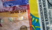 Тенге ослаб в конце недели