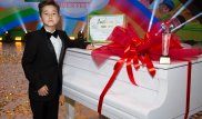 11-летний школьник получил белый рояль от Президента Казахстана