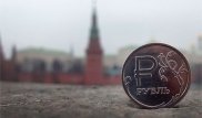 Рублю предрекли "черный понедельник"