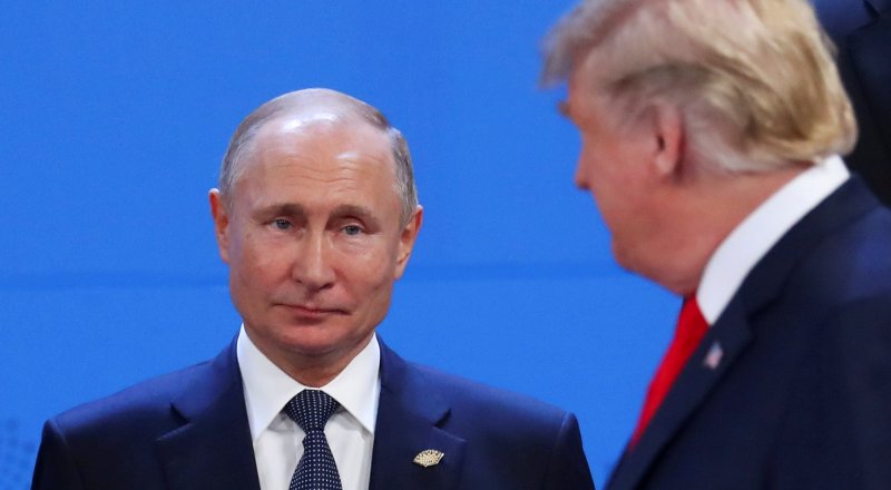 Владимир Путин и Дональд Трамп на саммите G20 в Аргентине. © Reuters