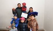 Проживавшей в бане многодетной семье подарили дом в Талгаре