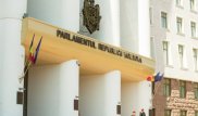 Министр юстиции Молдавии уволился из-за "несовместимости с должностью"