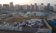 Возле EXPO образовался склад из мусорных баков и груды металла