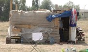 Многодетная семья живет под Алматы в лачуге из полиэтиленовых пакетов