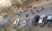 Массовая драка во дворе дома попала на видео в Актау