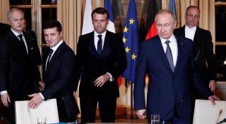 Владимир Зеленский, Эммануэль Макрон және Владимир Путин Париждегі саммитте © Reuters