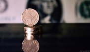 Тенге укрепился до 379,5 за доллар