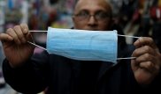 Японские эксперты показали, как правильно надевать защитную маску
