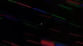 Показано цветное фото новой крошечной "Луны"