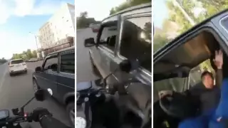 Видео потасовки мотоциклиста и водителя "Нивы" обсуждают в Сети