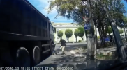 Столкновение самокатчика с грузовиком сняли на видео в Алматы