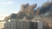 Густой черный дым в новостройке напугал астанчан