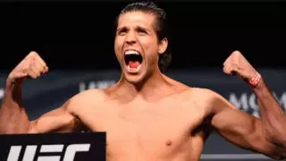 Американский боец победил "Корейского зомби" в главном поединке турнира UFC