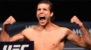 Американский боец победил "Корейского зомби" в главном поединке турнира UFC
