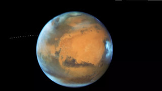 Фотографии Фобоса, движущегося вокруг Марса. Фото ©NASA