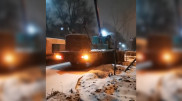 "Укладку" газона во время снегопада сняли на видео в Алматы