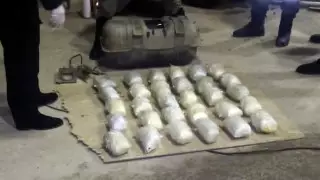 КНБ: 60 килограммов героина пытались провезти в Казахстан в Toyota Land Cruiser