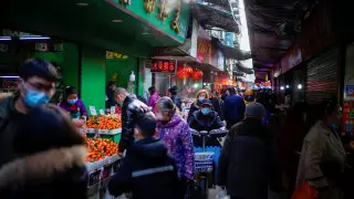 COVID-19 мог попасть в Ухань из других стран - ВОЗ