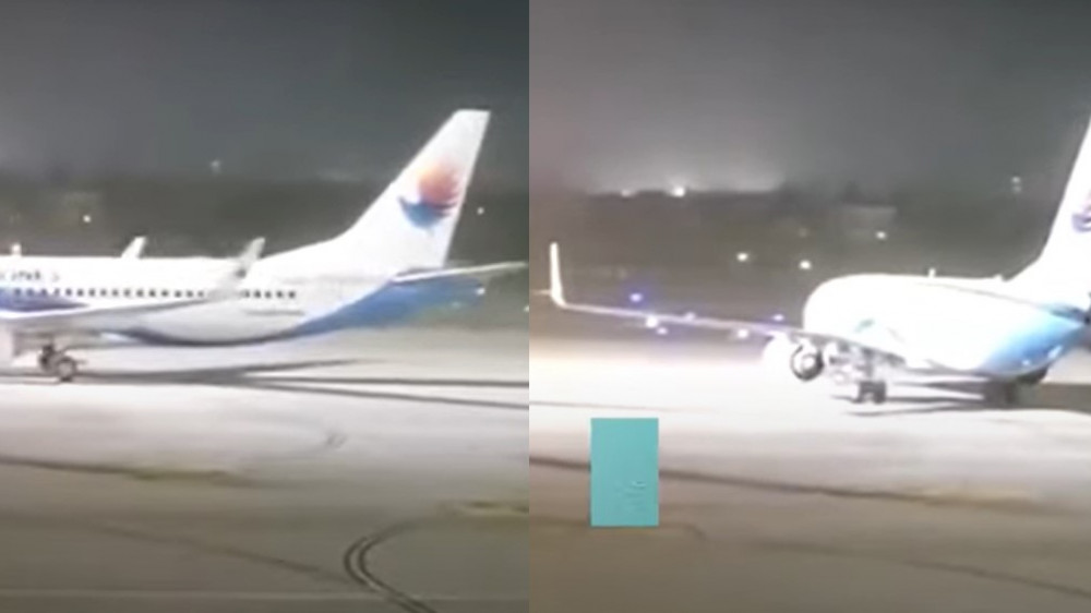 Ураган раскрутил припаркованный самолет в Китае