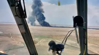 Третий день тушат пожар на берегу Каспия