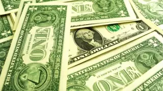 Курс доллара снова снизился