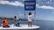 Племянница Усамы бен Ладена вышла на протесты с плакатом в поддержку Трампа