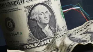 Курс доллара снова снизился