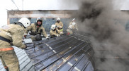 Сложный пожар пришлось тушить при помощи автопоезда в Алматы