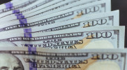 Курс доллара вырос почти на 7 тенге
