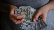 Курс доллара вырос почти на 10 тенге