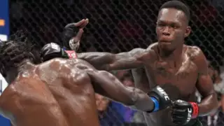 Исраэль Адесанья одержал победу в главном бою турнира UFC 276