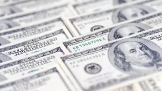 Курс доллара вырос почти на 2 тенге