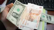 Названы официальные курсы доллара и рубля на 21 сентября